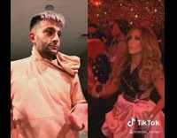 Jlo takes off hood pink sweater guy 