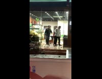 Guy throws food on ground grocery store