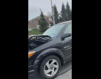 Black Car Continues to Drive After Accident 