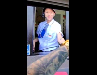 Man uses bread to pay at drive through