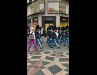 Lady with selfie stick gets pushed away