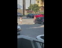 Black white pants car neighborhood white prius