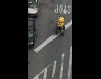 person dressed as pikachu on motor bike