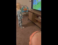 Young boy scare sister with scary mask