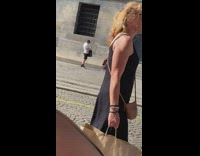 Woman brown pants sit on stairs beside door