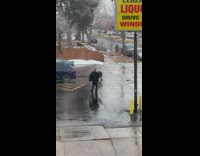 Woman in black outfit dance on the parking lot