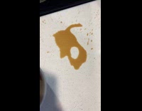 Womans spilled coffee looks like hyperpigmentation drawing