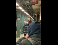 Train passegner wears white mask 