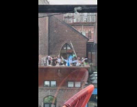 Collab WINY - Inflatable shark costume at rooftop building party