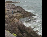 Man white top lie down seaside stairs