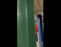 Religious choir group singing at subway station 