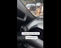 Manhole on street broken by the flood