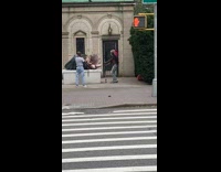 shirtless man in native american headdress 