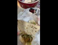 Grandma makes quesadilla for grandson