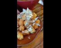 Man shows food plate moves through wind