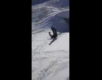 Guy skis down mountain scorpion black jacket