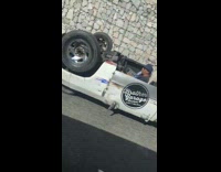 Guy drives upside down car on freeway