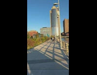 Man Jogs and Looks at Someone on Panda Helmet