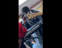 Man dances right in front of live band playing Mexican music