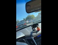 Collab Winy - Plate number hangs behind car at street