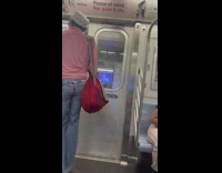 Person dances before exiting train 