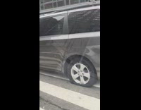 Car with flat and sideways tire road