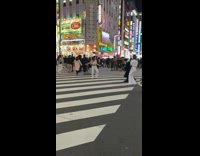 Woman dance crowd of people shinjuku crossing tokyo