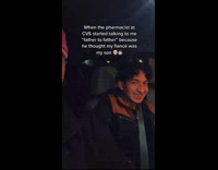 Guy in car next to other guy laughing 