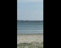 Collab IITW - Lady in Swimwear Jumps Repeatedly on Beach