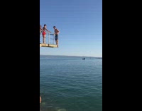 Man backflips and hits its body on the water
