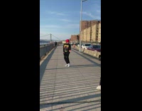 Guy red hat long sleeves dance video