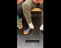 Man wears flaming skeleton clogs ride subway