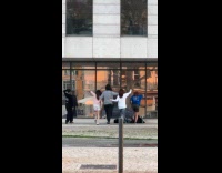 Collab IITW - Five people dances front of mirrored building