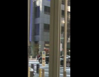 Man takes photo stopped car middle of the road