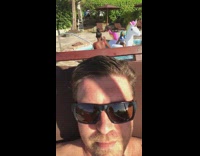 Girl poses in unicorn pool float 