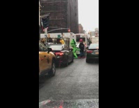 People in super mario costumes crossing street