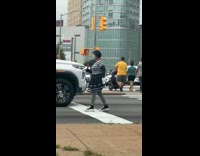 Woman mime performs on the street 
