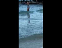 Guy takes photo of yoga girl