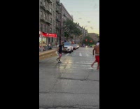 Man drag casket middle of the street