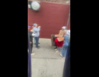 Ladies with Pizza on their Back Pose for Picture