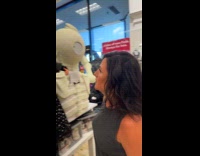 Woman looks like witch props inside store