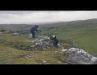 Girl fakes cliff hang for photo 