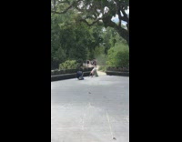 Pink shirt girl downward dog yoga pose 