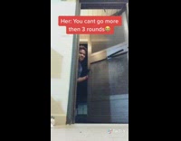 Blue shirt guy walks around house refrigerator 