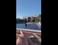 Woman printed dress on poolside part 1