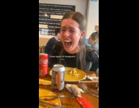 Girl in black shirt laughing cant stop