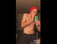 Guy red durag subway drink shaking
