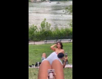 Collab IITW - Woman pink dress poses at the park