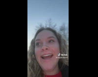 Mom shows girl her plot of land 