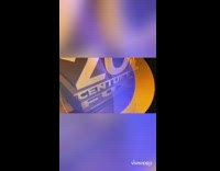 Guy pats butt of dog laying down 